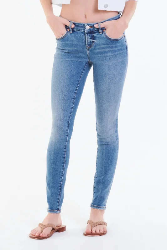 Joyrich Mid Rise Ankle Skinny Jeans In Medium Wash